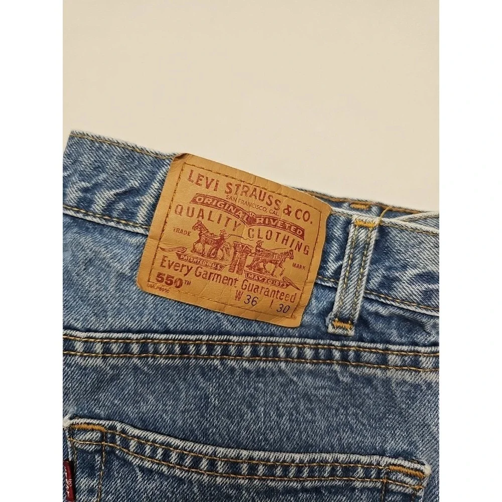 Levi's 550 Mens Blue Relaxed Tapered Vintage Denim Jeans Fading Stained Sz 36x30